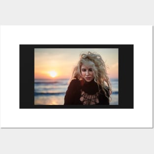 Beautiful woman on the beach at sunrise Posters and Art